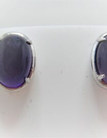 Rhodium plated 925 sterling silver oval studs set with natural Amethyst   11.6 X 8.65 MM