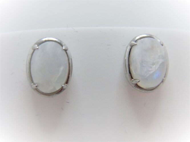 Rhodium plated 925 sterling silver oval studs set with natural Rainbow moonstone  11.6 X 8.65 MM