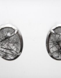 Rhodium plated 925 sterling silver oval studs set with natural Rutile quartz   11.6 X 8.65 MM