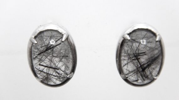 Rhodium plated 925 sterling silver oval studs set with natural Rutile quartz   11.6 X 8.65 MM