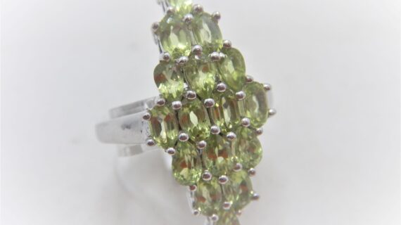 Rhodium plated 925 sterling silver ring set with natural Peridot 30 X 14.4MM