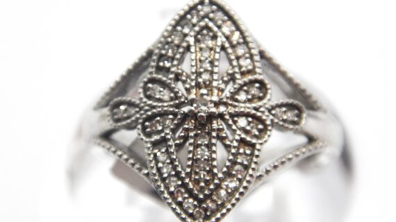 Rhodium plated 925 sterling silver ring set with natural Diamonds 18.6 X 10.6MM