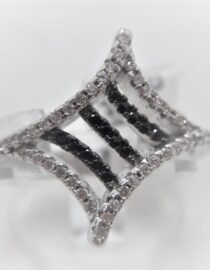 Rhodium plated 925 sterling silver ring set with black & white CZ 18.15 WIDE