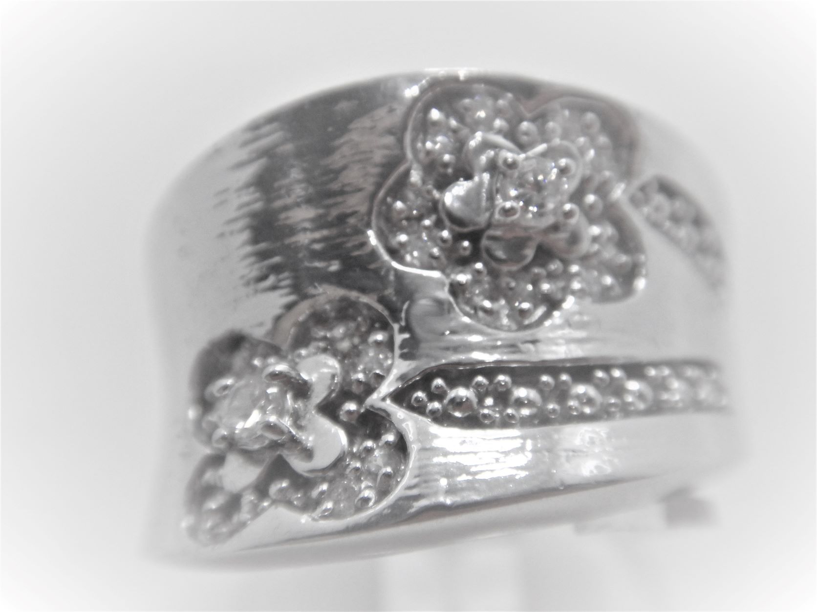 Rhodium plated 925 sterling silver ring scratch finish  set with 2 CZ 16.1 WIDE