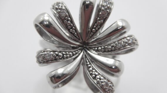 Rhodium plated 925 sterling silver ring set with white CZ DIAM 23.0