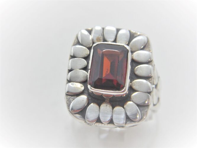 925 Sterling silver ring set with synthetic red stone Approx size 19.2 mm x 16.2 mm