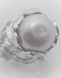 Rhodium plated 925 sterling silver set with natural freshwater pearl Approx size  17mm diam