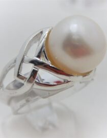 Rhodium plated 925 sterling silver ring set with natural freshwater pearl Approx size  11.8mm diam