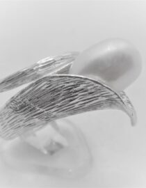 Rhodium plated 925 sterling silver ring set wit natural freshwater pearl Approx size 15mm