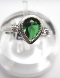 Rhodium plated 925 sterling silver ring set with green CZ