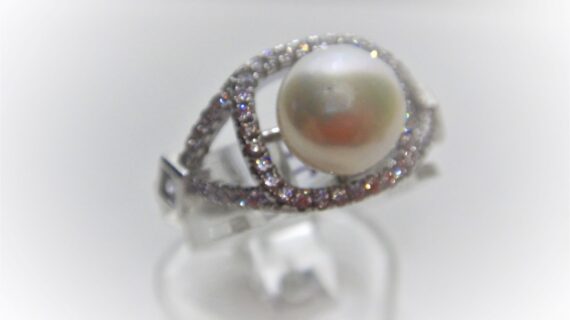 Rhodium plated 925 sterling silver ring ser with natural freshwater pearl & C Z Approx size 11.6mm x 12.25mm
