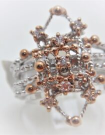 Rhodium plated 925 sterling silver ring with gold plating & set with CZ 23.5 X 11.75MM