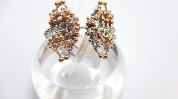 Rhodium plated 925 sterling silver ring with gold plating set with CZ 15.7 X 20.6MM