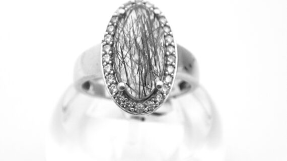 Rhodium plated 925 sterling silver ring set with natural Rutile quartz & cubic zirconia Approx size  19mm x 12mm