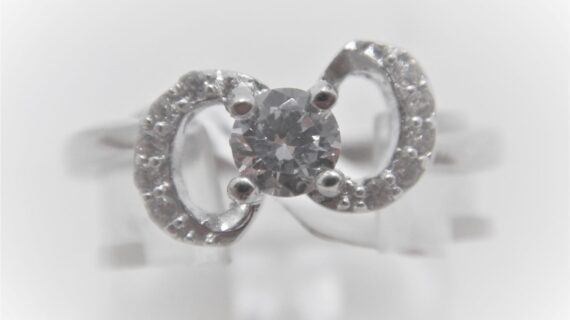 Rhodium plated 925 sterling silver ring set with CZ  7.15 WIDE