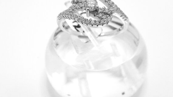 Rhodium plated 925 sterling silver ring set with white CUBIC ZIRCONIA Approx size  10.3mm wide