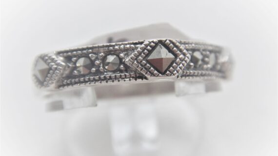 925 Sterling silver ring set with genuine marcasite Approx size  4.2mm wide