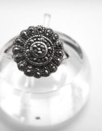 925 Sterling silver ring set with genuine marcasite Approx size  13.8mm diam