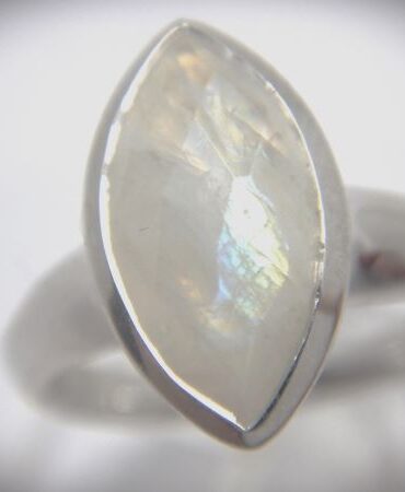 Rhodium plated 925 sterling silver ring set with natural faceted  rainbow moonstone marquise shape Approx size 16.5mm x 9.5mm