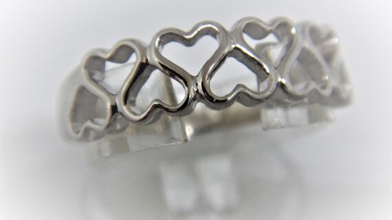 Rhodium plated 925 sterling silver ring with heart pattern