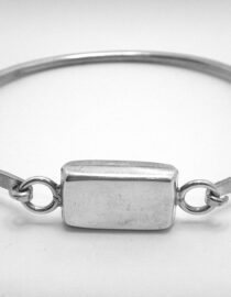 925 Sterling silver engravable bangle with rectangular top approx 2.6mm thick Approx size 60mm diam Engravable top approx size 12mm x 19.6mm