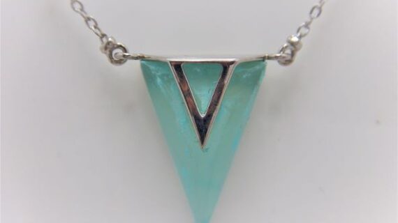 Rhodium plated 925 sterling silver necklace with natural Aqua chalcedony Approx size  20.6mm x 13mm x 50cm long
