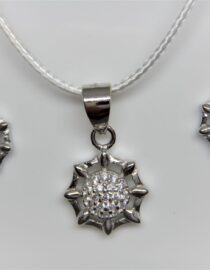 Rhodium plated 925 sterling silver pendant & earring set with white cubic zirconia Approx size pendant  11mm diam Approx size  earrings  8mm diam