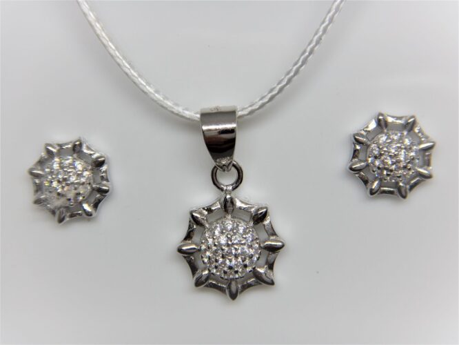 Rhodium plated 925 sterling silver pendant & earring set with white cubic zirconia Approx size pendant  11mm diam Approx size  earrings  8mm diam