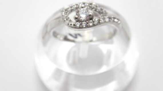 Rhodium plated 925 sterling silver ring set with CZ 7.55 WIDE